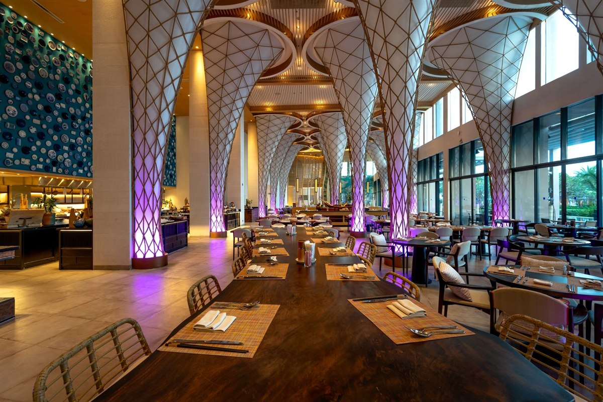 Spacious modern restaurant interior with unique ceiling design